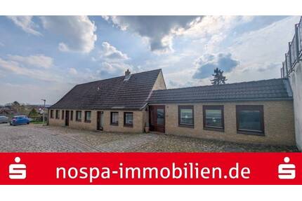Stadthaus mit Potenzial! Wohnhaus mit vermieteter Einliegerwohnung und Garage - Schleswig