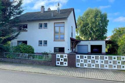 Bruchmühlbach-Miesau - Familienfreundliches Einfamilienhaus mit schönem Garten und Doppelgarage