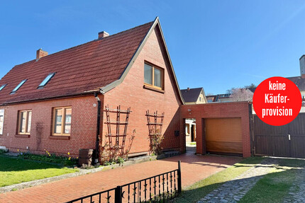 HORN IMMOBILIEN++ Neubrandenburg, Doppelhaushälfte mit Keller, Garage und Nebengelass