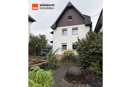 Ein Zweifamilienhaus zum Wohlfühlen, mit großem Garten und Garage in Unkel