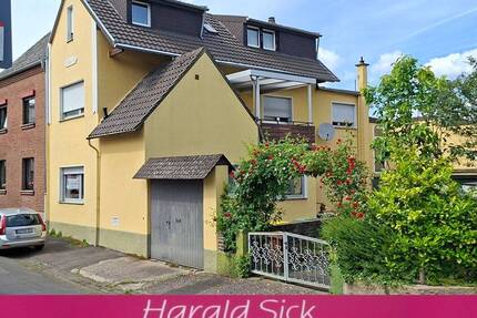 NEUER PREIS: 7-ZIMMERHAUS MIT 3 BÄDERN, 2 GARAGEN UND GROSSEM GARTEN. - Bornheim