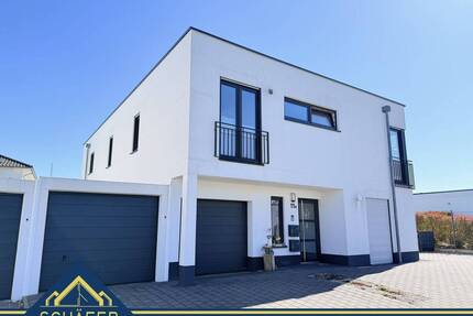 Attraktive Erdgeschosswohnung mit Top-Ausstattung, Garage und Garten in Schwalbach-Hülzweiler - Schwalbach / Hülzweiler
