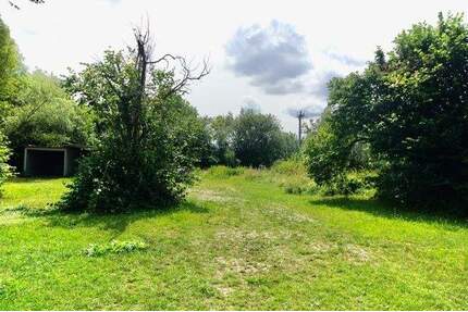 Sonniges Baugrundstück mit Baugenehmigung für RMH in Untermenzing - Allach! - München / Allach-Untermenzing