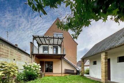Haus zum Kaufen in Lingenfeld 365.000,00 € 217 m²