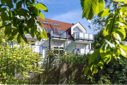 AIGNER - Lichterfülltes Dachgeschoss: Wohnen auf zwei Etagen mit Südterrasse - am Agricola-Park - München Laim