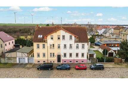 Investieren und gestalten: MFH in Lützen mit 3 Wohnungen, Garten, Garage und großzügigem Grundstück