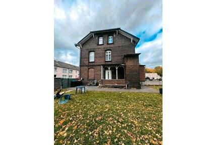 EinfamilienhausZweifamilienhaus mit Bauland - Bottrop Ebel