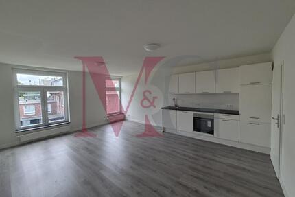 Exklusives Wohnen im historischen Schulgebäude - 2-Zimmer-Wohnung mit Stil und Geschichte - Wilhelmshaven