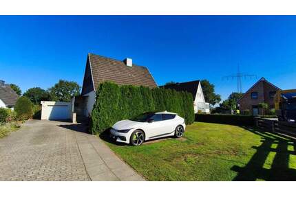 Wohnen mit Potenzial - Einfamilienhaus mit großem Baugrundstück in Haseldorf