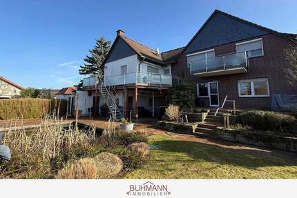 31515 Wunstorf - Großenheidorn - Zweifamilienhaus mit Teich und Garagen