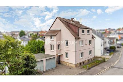 Gepflegtes 3-Familienhaus mit 245 m² Wohnfläche, Scheune, Garagen und Garten in Petersberg