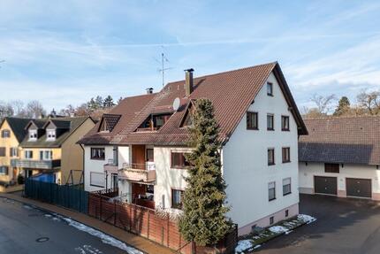 Familienfreundliche 4-Zimmer-Erdgeschosswohnung mit Terrasse, Gartenanteil und Garage - Deißlingen