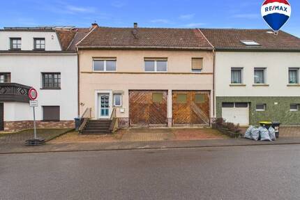 Einfamilienhaus mit großzügiger Werkstatt in Diefflen - Dillingen / Diefflen