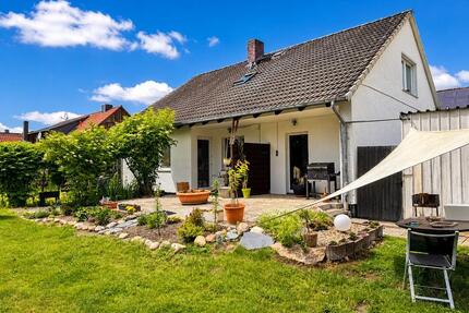 Einfamilienhaus oder 3 Wohnungen mit Top Rentite und Bauland - Wolfsburg