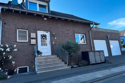 Einfamilienhaus mit Garage und Einliegerwohnung Haus Reihenhaus - Bergheim Ahe