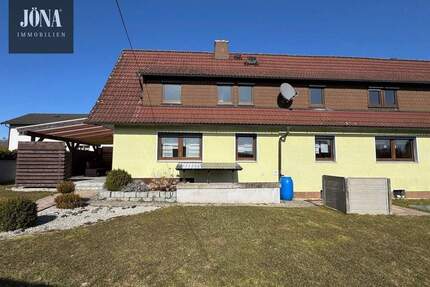 Wohnimmobilie mit großem Garten und Doppelgarage in einem angenehm ruhigen Umfeld - Marktleugast / Mannsflur