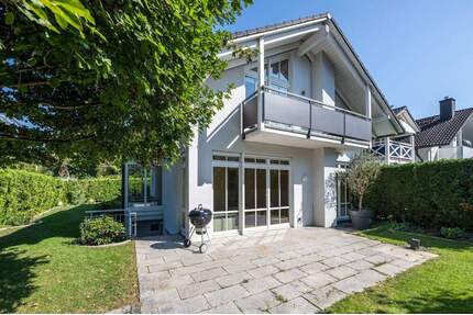 AIGNER - Ihr Traumhaus in Gräfelfing: Exklusive Doppelhaushälfte in erstklassiger Lage