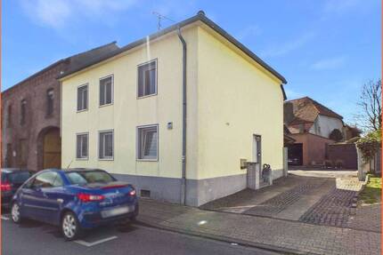 Gepflegtes Wohnhaus mit idyllischem Garten und Garage in Geilenkirchen-Würm