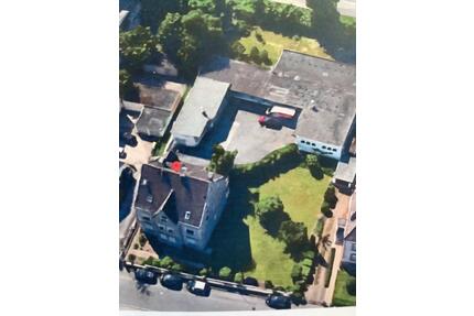 Ein Mehrfamilienhaus mit Gewerbefläche und Baugrundstück - Hagen Hagen-Nord