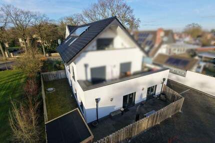 Ebenerdig! Neuwertig! Sofort bezugsfrei! Moderne 3-Zimmer-Erdgeschosswohnung zum Kauf mit PKW Stellplatz, Einbauküche und Garten - Spelle