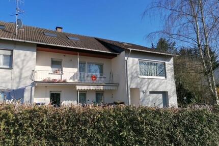 Erdgeschosswohnung mit Doppelgarage, eigenesGrundstück, vermietet - Siegen Eiserfeld