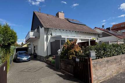 Haus zum Kaufen in Münster (Hessen) 398.000,00 € 130 m²
