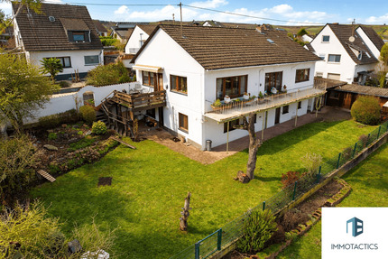 Einfamilienhaus mit zwei Balkonen, Terrasse, Garten, Garage und Werkstatt in Langenlonsheim
