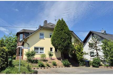 Traben-Trarbach: Solides Zweifamilienhaus mit Garage in sonniger, hochwasserfreier Ortsrandlage! - Traben-Trarbach / Wolf