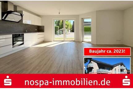 Neuwertige 3-Zimmer Eigentumswohnung mit PKW-Stellplatz und Terrasse im 