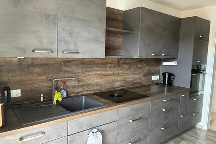 Großzügige, helle 4-Zimmerwohnung mit Garten und Garage - Tann