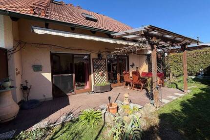 ANSPRECHENDE DOPPELHAUSHÄLFTE MIT LIEBEVOLLEM GARTEN IN NANDLSTADT