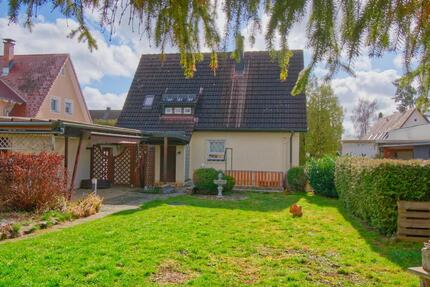 Wohnen im Grünen: Gepflegtes Siedlungshaus mit idyllischem Garten im beliebten Wohngebiet 