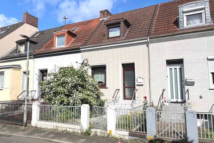 PURNHAGEN-IMMOBILIEN - Reihenmittelhaus in ruhiger Nebenstraße von Bremen-Gröpelingen! - Bremen / Gröpelingen