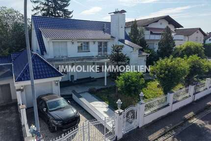 Haus zum Kaufen in Hasselroth-Neuenhaßlau 619.000,00 € 238 m²