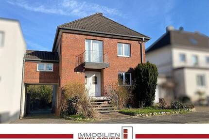 Einfamilienhaus mit zwei Garagen und Garten in guter Lage von Übach-Palenberg