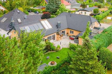 Haus zum Kaufen in Hoppegarten 1.200.000,00 € 341.22 m²