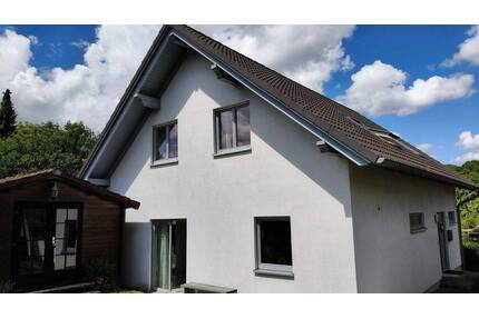 Familienfreundliches Einfamilienhaus mit großer Küche, Gartenhütte und Doppelcarport in Oelkassen - Lüerdissen / Oelkassen