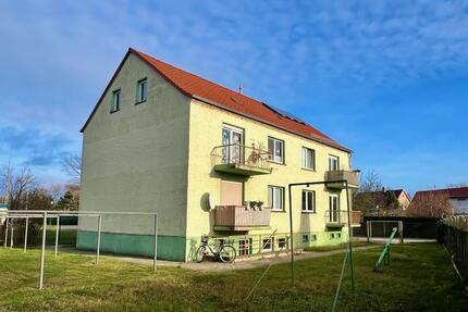 Erstbezug nach Sanierung - 3-Raumwohnung auf ca. 60 m² mit eigenem Garten, Balkon und Garage - Bitterfeld-Wolfen