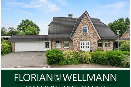 Heeslingen | Stilvolles Einfamilienhaus läßt keine Wünsche offen - Pool, Kamin und toller Garten.