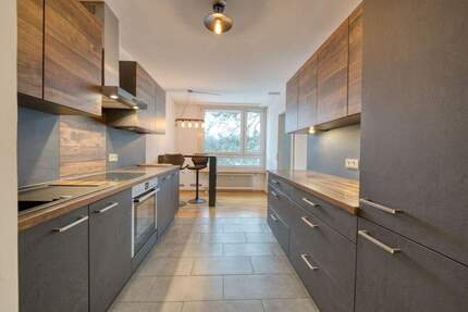 Familienfreundliche 3-Zimmer-Wohnung, Innenhoflage & TG-Stellplatz - modernisiert & sofort verfügbar - Ottobrunn