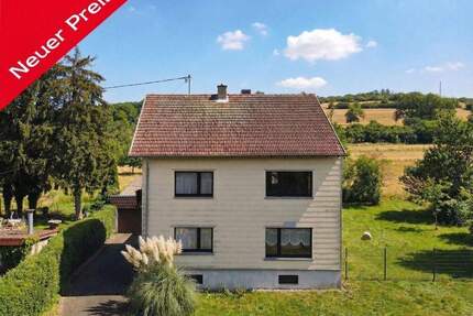 Einfamilienhaus im Mandelbachtal - Wohnen mit unverbaubarem Weitblick!