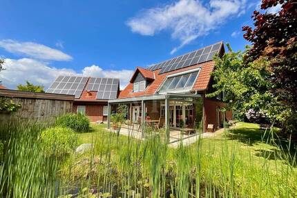 Two in One - Beeindruckendes Architektenhaus mit Einliegerwohnung und traumhaftem Garten in Gestorf! - Springe / Gestorf