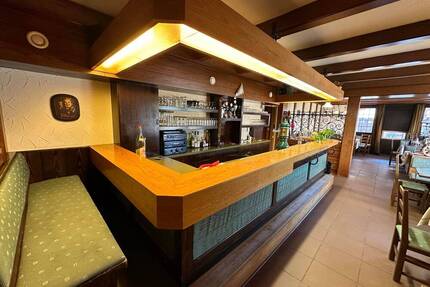 NEUER PREIS-Mehrfamilienhaus mit großem Gewerbeteil - Weiskirchen