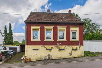 Charmantes Einfamilienhaus mit großem Grundstück und Werkstatt in Saarbrücken-Dudweiler - ideal für Handwerker!