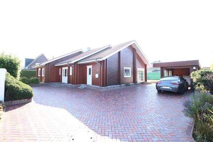 Topgepflegtes, schickes Holzwohnhaus mit Carport-Gerätegebäude in ruhiger Sackgassenlage - Molbergen