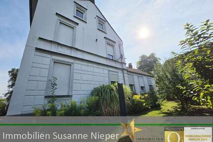 Haus zum Kaufen in Solingen 380.000,00 € 205 m²