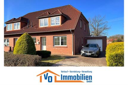 Renovierte DHH mit überdachter Terrasse, Garten & Garage in zentraler Lage von Ostgroßefehn