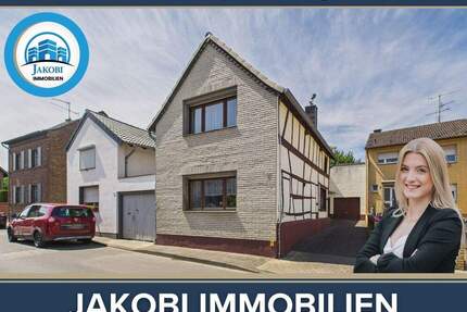 Teilmodernisiertes Einfamilienhaus mit Garage und Nebengebäude in Vettweiß-Kelz!