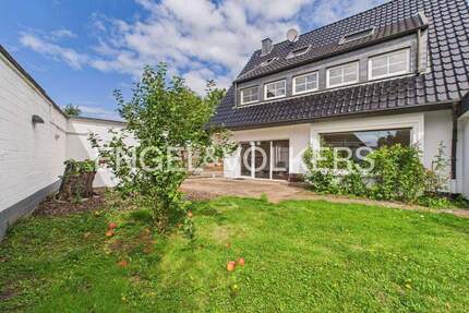 Helle Gartenwohnung mit Kamin, Doppelgarage nahe dem Krefelder Stadtwald