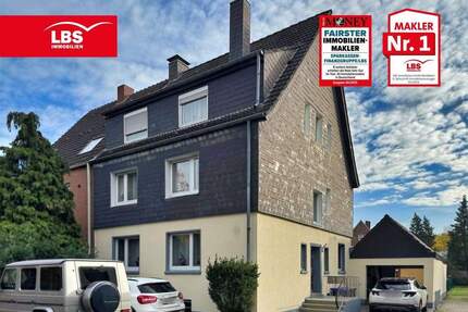 Zentral in Dorsten: Erdgeschosswohnung mit Wintergarten, Garten und Garage